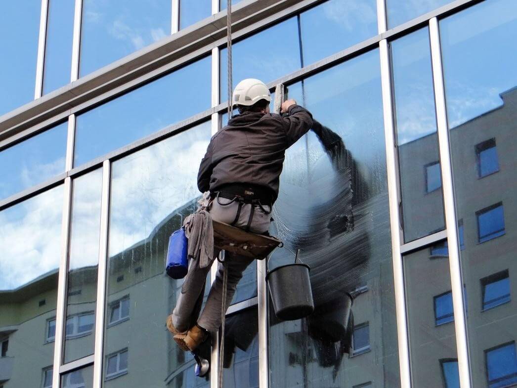 Commercial window cleaning on a Kansas City building